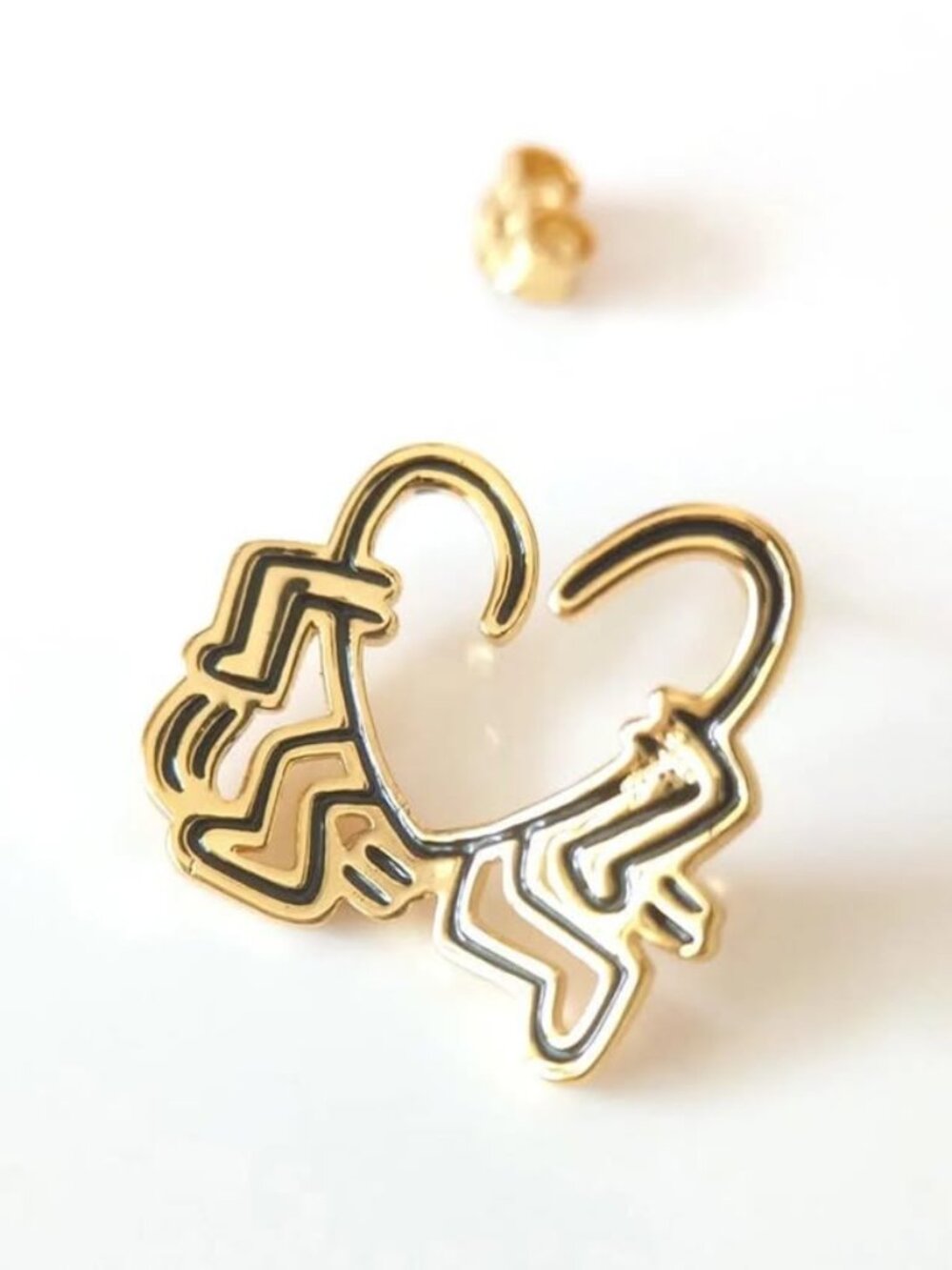 Keith Haring-inspired design single stud earring. Gold-finish earring. Pierced.